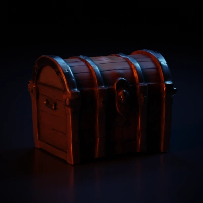 Treasure chest with metal reinforcements, keyhole, wooden structure.