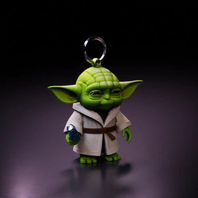 small green alien figurine.