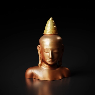 Statue of Buddha, serene expression, topknot.