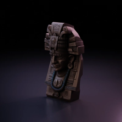 Ancient sculpture with intricate headdress.
