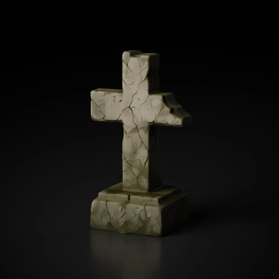 Stone cross monument with a carved animal head.