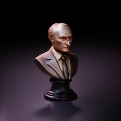 Bust sculpture of man in suit.