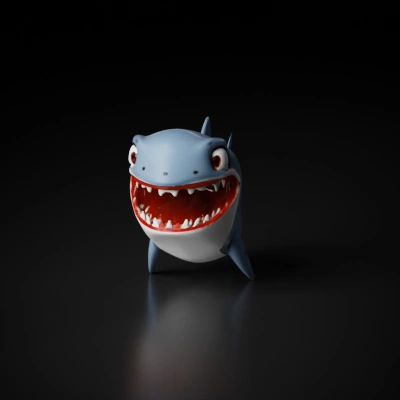 Shark cartoon character with wide grin, big eyes.