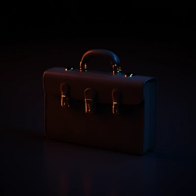 Leather briefcase with handle and buckles.