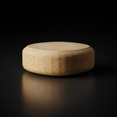 Rounded woven ottoman, textural.