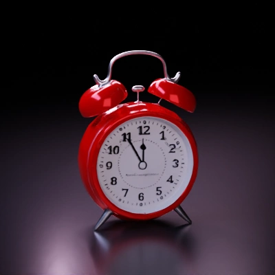 Old-fashioned alarm clock, two bells on top.