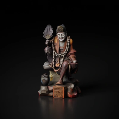 A seated figure statue.