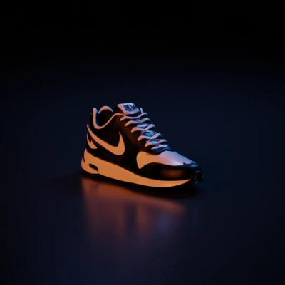 Athletic shoe with swoosh logo.