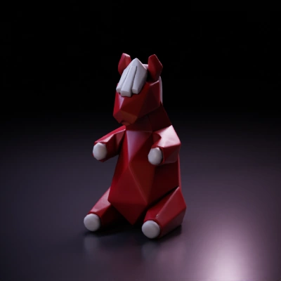 Low-poly red animal figurine, likely a fox or dog.