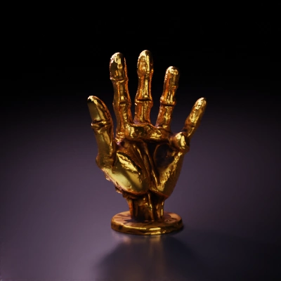 Skeleton hand sculpture, gold, artistic detail.