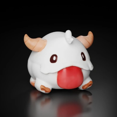 Cute plush creature with horns and wide eyes.