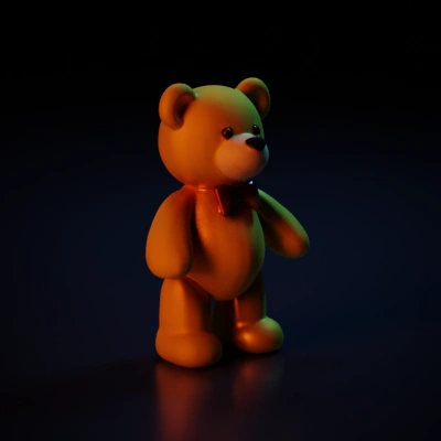 Stuffed teddy bear with bowtie.