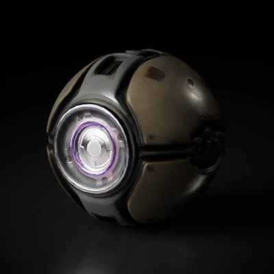 Spherical mechanical object with central glowing core.