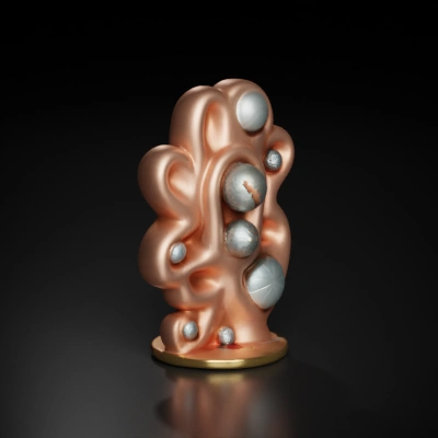 Organic sculpture with embedded spheres.