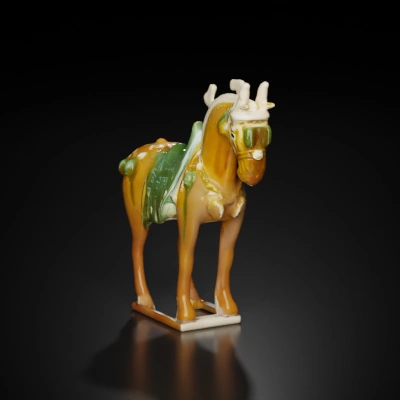 Ceramic horse figurine, traditional design, detailed features.