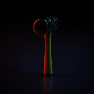 Hammer with cylindrical head, wooden handle.