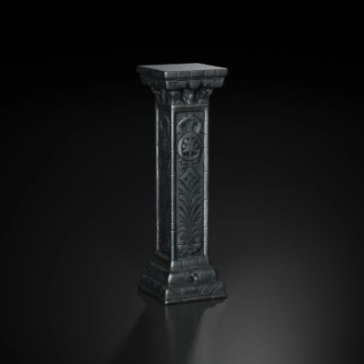 Intricately detailed stone pillar, floral and vine patterns.
