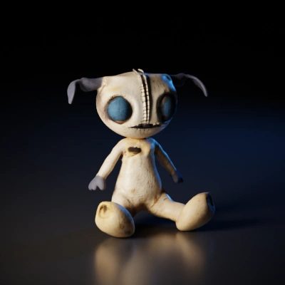 Ragged voodoo doll with button eyes.