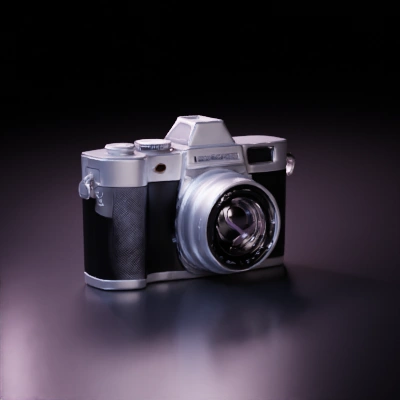 Vintage camera with lens, compact body, intricate details.