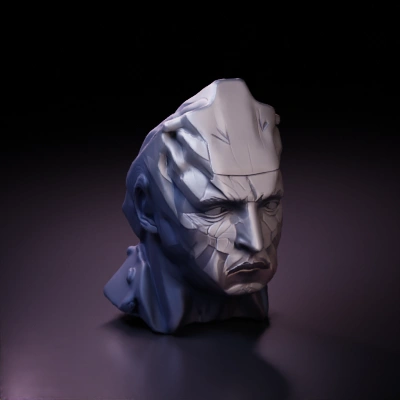 Faceted sculpture of a man's head.