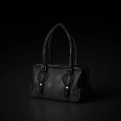Black Leather handbag with rounded handles.