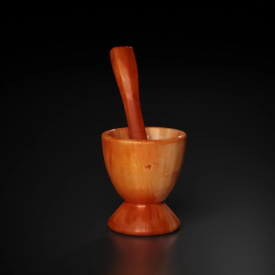 Mortar and pestle kitchen tool, wooden, used for grinding.