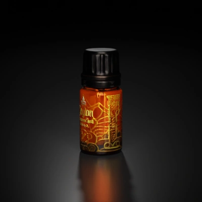 Cylindrical essential oil bottle with detailed label design.
