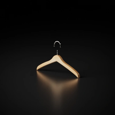 Wooden clothes hanger, wardrobe accessory.