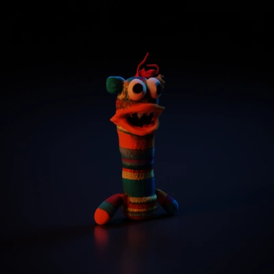 Knitted character with googly eyes, fun design.