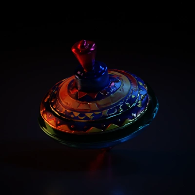 Metal spinning top with decorative patterns.