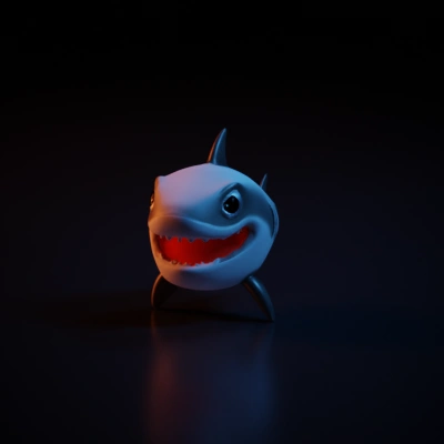 Cartoonish shark with big eyes and a wide smile.