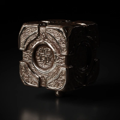 Decorative intricate cube with engraved patterns.