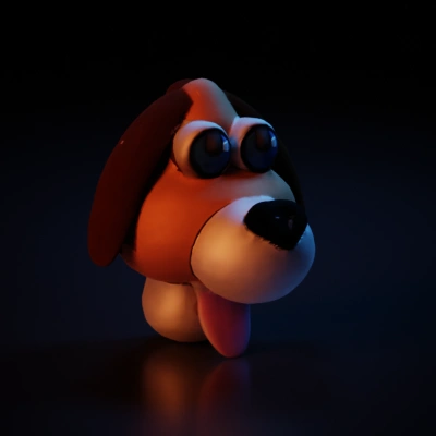Dog face with big eyes, mouth open.