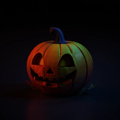 Carved Halloween pumpkin with glowing face.