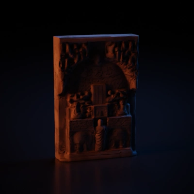 Ancient stone relief with detailed carvings.