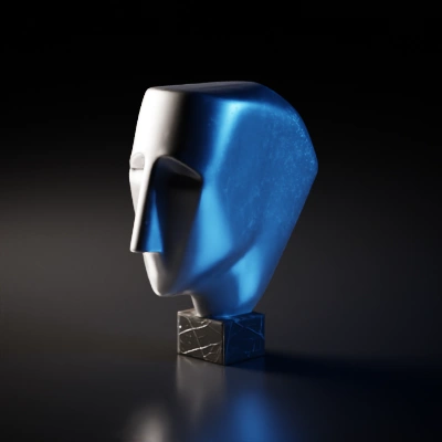 Abstract stone sculpture, elongated face, simplified features.