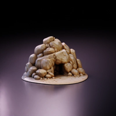 Cartoon-style rock pile on sandy ground.