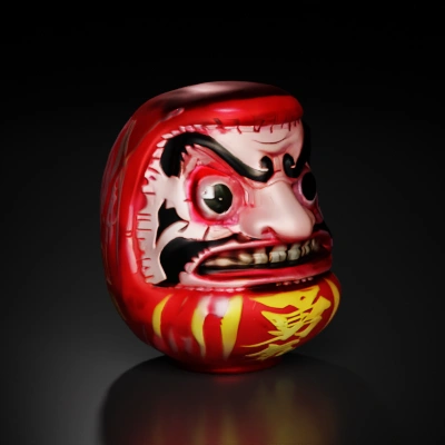 Traditional Japanese Daruma doll with intense face.