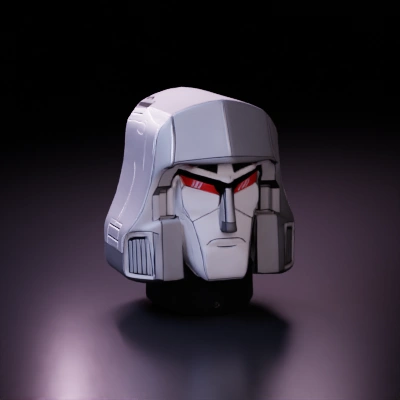 Robotic head with angular features, menacing expression.