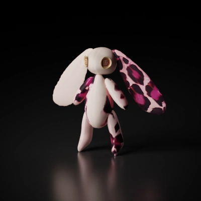patched stuffed rabbit toy.