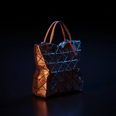 Geometric triangular-patterned handbag, modern design.