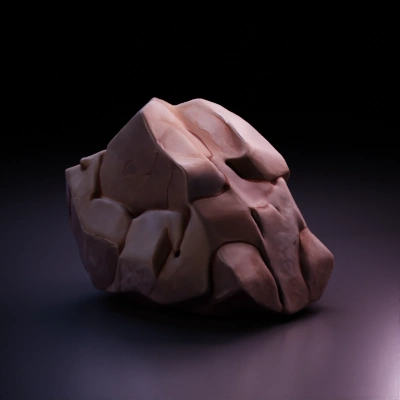 Large faceted rock with regular surfaces.  gray rock stylized rock
