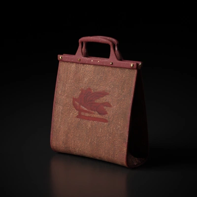 Elegant handbag with Pegasus emblem, box-like structure.