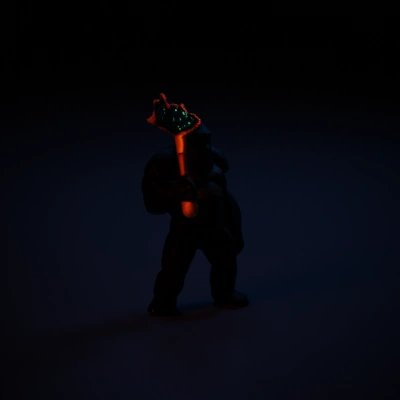 Furry ape-like creature wielding a spear.