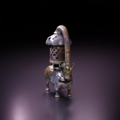 Metallic bull-shaped incense burner, antique aesthetic.