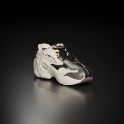 Chunky athletic sneaker, textured design, lace-up.