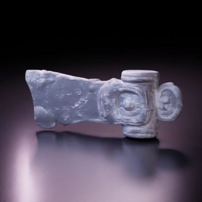 Weathered ancient stone artifact with circular carvings.