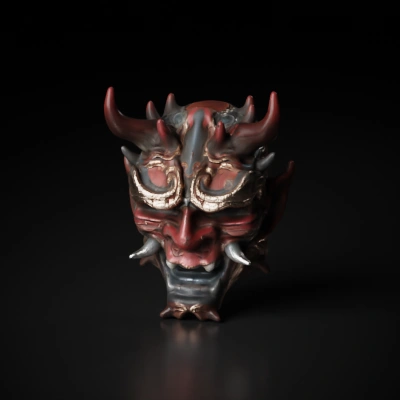 Ornate demon mask, menacing expression, horns, tusks.