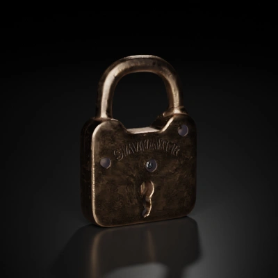 Vintage metallic padlock with keyhole, rectangular shape.