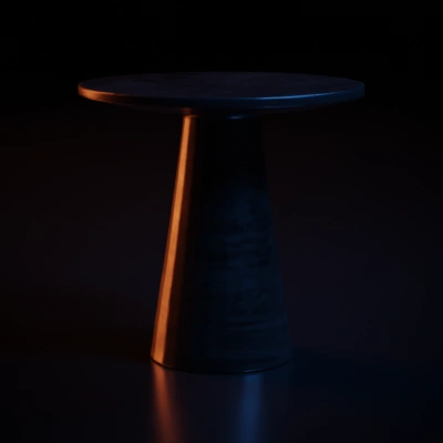 Minimalistic cylindrical table, sleek design.
